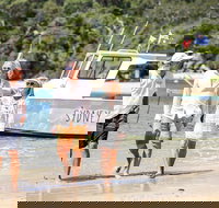 Sydney Harbour Boat Tour with Unique Beach Landings and Local Guide