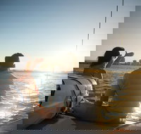 Gold Coast Sunset Cruise with sparkling wine  nibbles platter - Events Australia