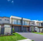 Escape at Nobbys Executive Townhouse 1 74 Pacific Drive - Events Australia