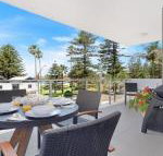 Bathers at the Beach across from Surf Beach - Events Australia