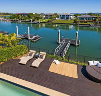 Luxury suite  private living room on waterfront in Hope Island - Events Australia