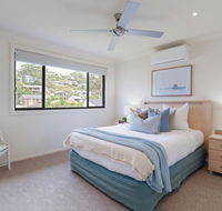 'Sandy Point Haven' 21a Sandy Point Rd - Stylish Haven with WIFI Air conditioning  Water views - Events Australia