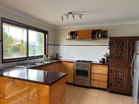 House And Van On The River - Events Australia 2